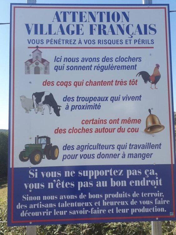 panneau-attention-village-francais_4878970.jpeg