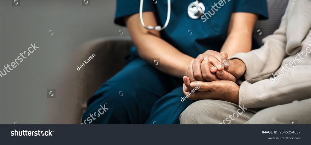 stock-photo-a-female-nurse-caregiver-holds-hands-to-encourage-and-comfort-an-elderly-woman-for-care-and-trust-2545254637.jpg
